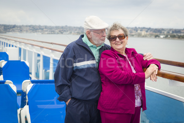 Senior Couple Enjoying The Deck of a Cruise Ship Stock photo © feverpitch