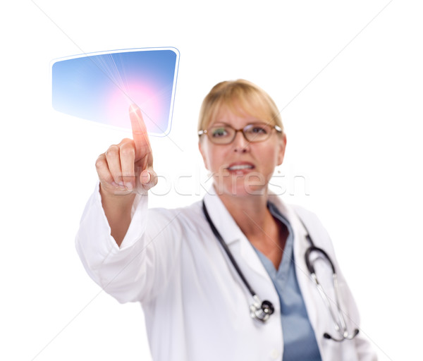 Female Doctor Touching Button on Touch Screen Stock photo © feverpitch