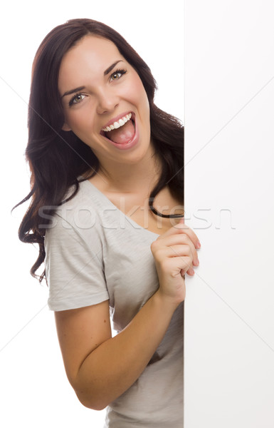 Beautiful Mixed Race Female Holding Blank Sign on White
 Stock photo © feverpitch