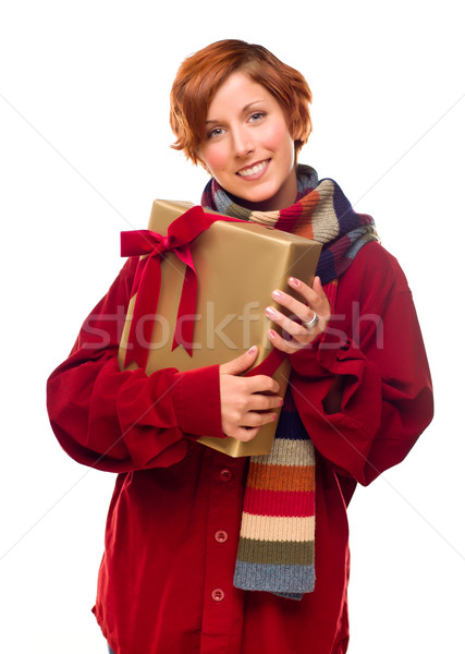 Pretty Red Haired Girl with Scarf Holding Wrapped Gift Stock photo © feverpitch
