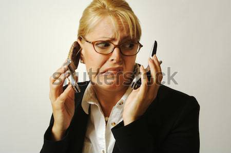 Angry Business Woman on Cell Phone Stock photo © feverpitch