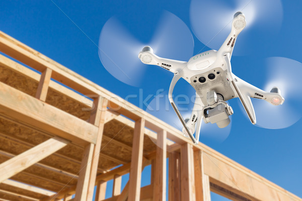 Drone Quadcopter Flying and Inspecting Construction Site Stock photo © feverpitch