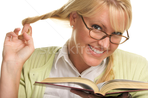 Stock photo: Female With Ponytails Reads Her Book