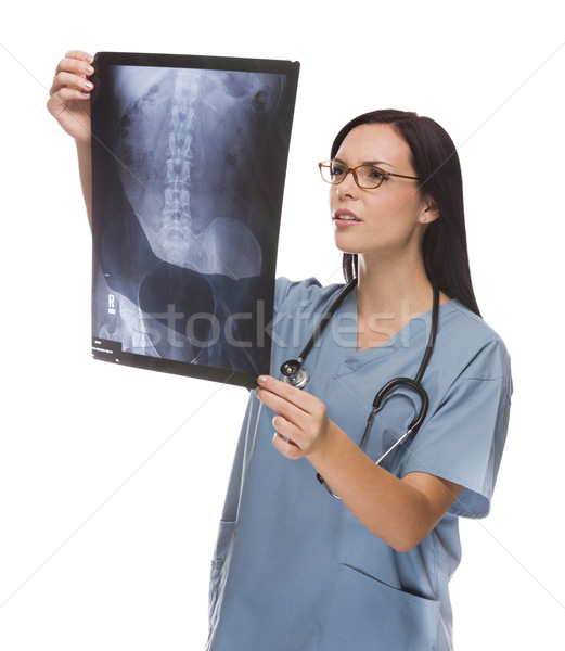 Mixed Race Female Doctor or Nurse Reviewing X-ray on White Stock photo © feverpitch