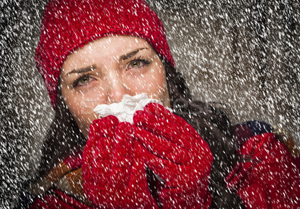 Sick Woman Blowing Her Sore Nose With Tissue and Snow Stock photo © feverpitch