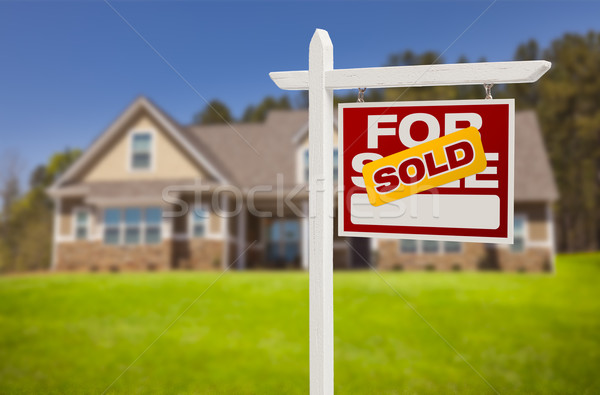 Sold Home For Sale Sign in Front of New House Stock photo © feverpitch