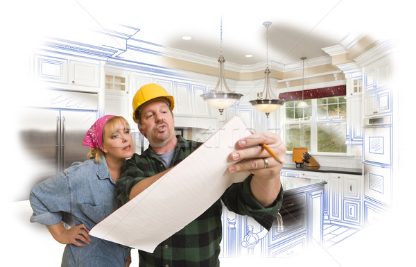 Contractor Discussing Plans with Woman, Kitchen Drawing Photo Be Stock photo © feverpitch