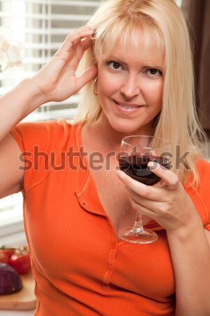 Blonde Socializing with Wine Glass Stock photo © feverpitch