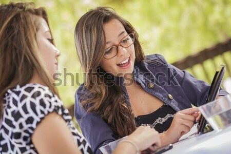 Stressed Sad Young Mixed Race Girl Being Comforted By Friend Stock photo © feverpitch