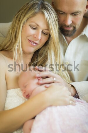 Young Mother Holds Newborn Baby Girl as Brother Kisses Her Stock photo © feverpitch