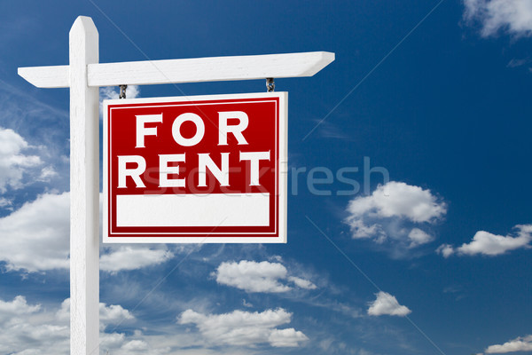 Right Facing For Rent Real Estate Sign Over Blue Sky and Clouds  Stock photo © feverpitch