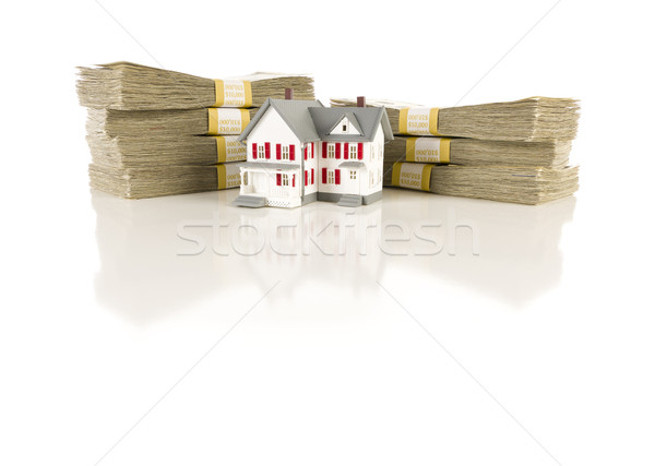 Stacks of Hundreds with Small House Stock photo © feverpitch