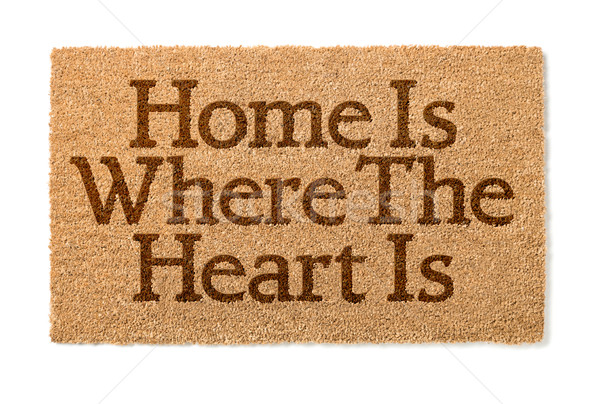 Home Is Where The Heart Is Welcome Mat On White Stock photo © feverpitch