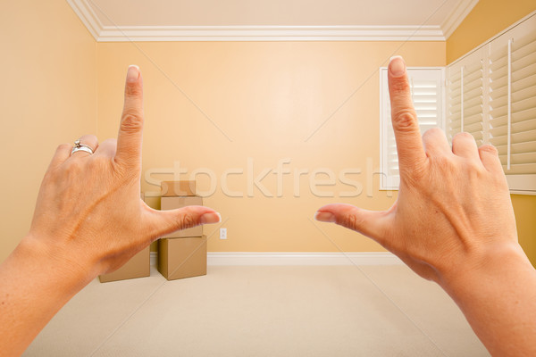 Female Hands Framing Beautiful Room Interior Stock photo © feverpitch
