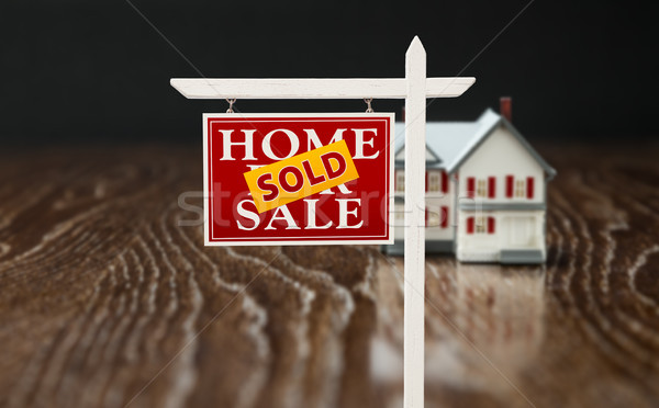 Sold For Sale Real Estate Sign In Front of Model Home on Reflect Stock photo © feverpitch