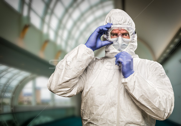 Man With Intense Expression Wearing HAZMAT Protective Clothing I Stock photo © feverpitch