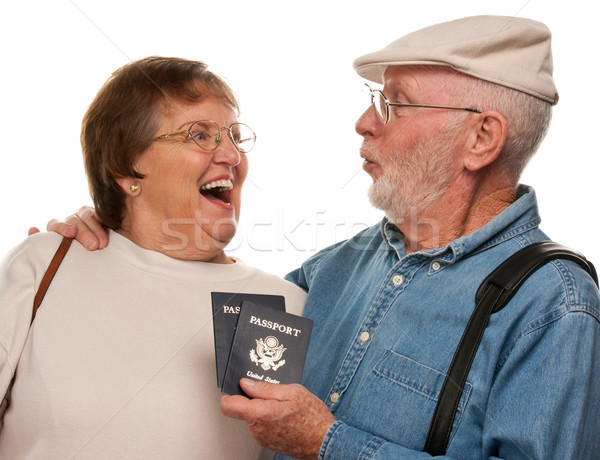 Stock photo: Happy Senior Couple with Passports and Bags on White