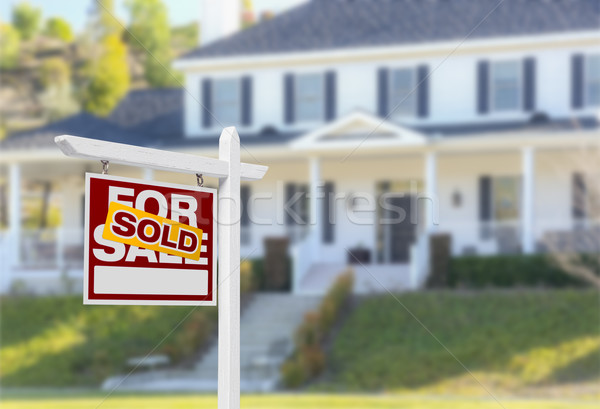 Sold Home For Sale Sign in Front of New House Stock photo © feverpitch