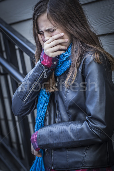 Young Crying Teen Aged Girl on Staircase Stock photo © feverpitch