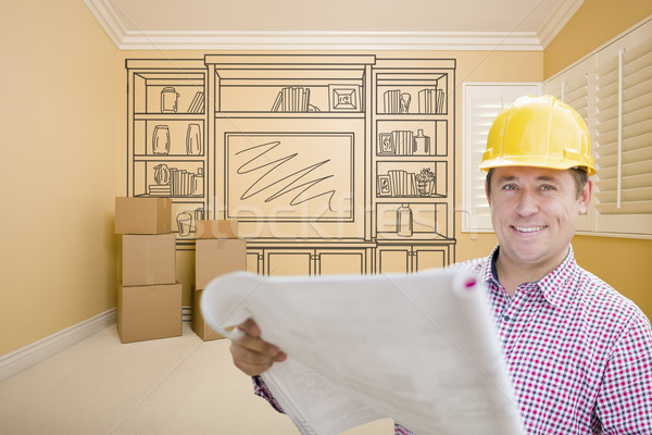 Male Construction Worker In Room With Drawing of Entertainment U Stock photo © feverpitch