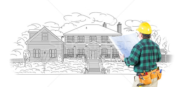 Stock photo: Male Contractor with Hard Hat and Tool Belt Looking At Custom Ho
