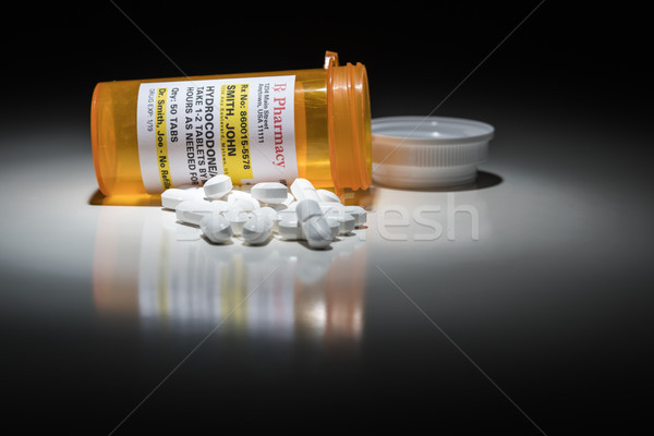 Hydrocodone Pills and Prescription Bottle with Non Proprietary L Stock photo © feverpitch