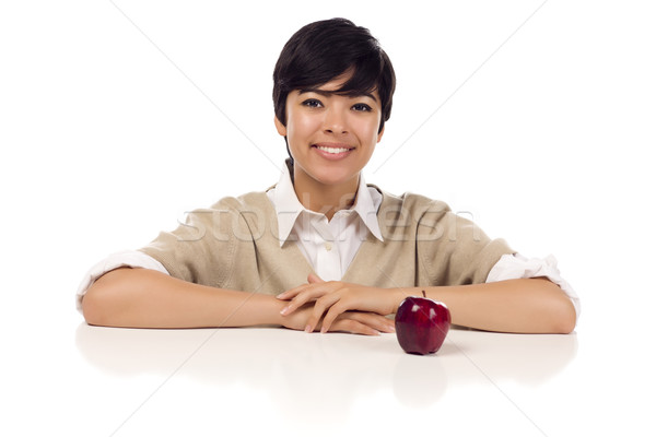 Stock photo: Smiling Mixed Race Young Adult Female Sitting with Apple