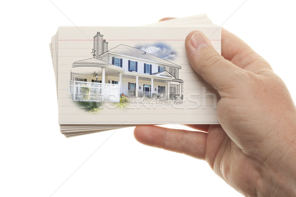 Male Hand Holding Stack of Flash Cards with House Drawing Stock photo © feverpitch