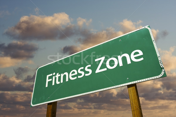 Fitness Zone Green Road Sign and Clouds Stock photo © feverpitch