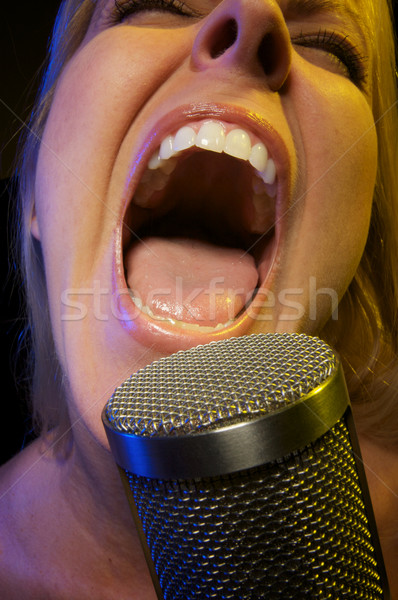 Stock photo: Woman Sings with Passion