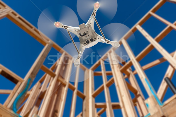 Drone Quadcopter Flying and Inspecting Construction Site Stock photo © feverpitch