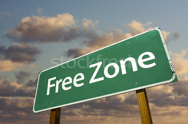 Free Zone Green Road Sign and Clouds Stock photo © feverpitch