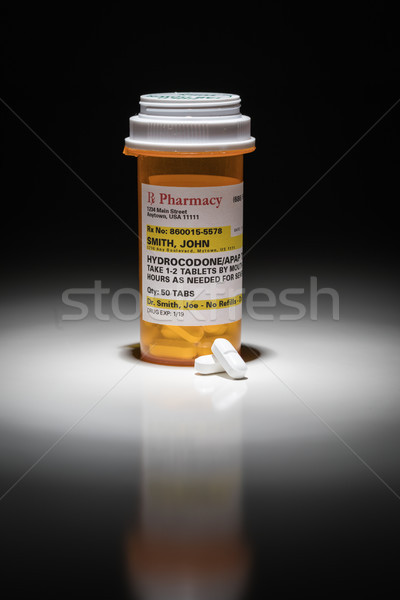 Hydrocodone Pills and Prescription Bottle with Non Proprietary L Stock photo © feverpitch