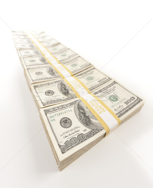 Fading Row of Hundred Dollar Bills Stacks Stock photo © feverpitch