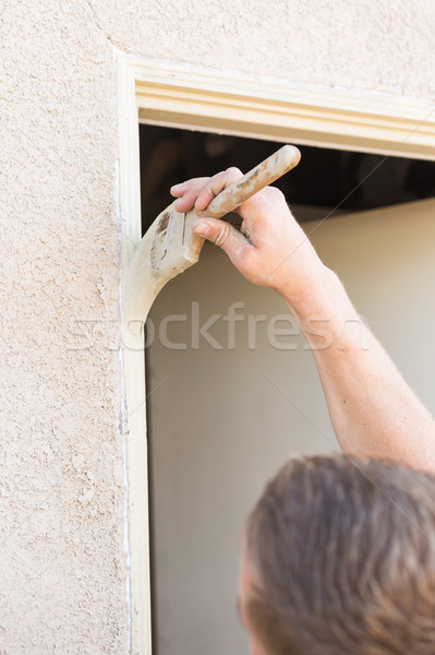 Professional Painter Cutting In With Brush to Paint House Door F Stock photo © feverpitch