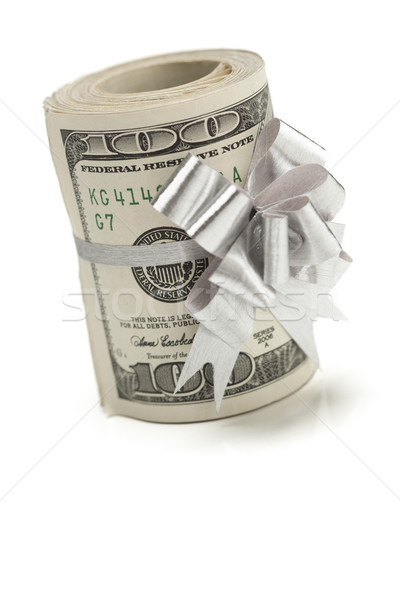 Stock photo: Roll of One Hundred Dollar Bills Tied Silver Bow on White