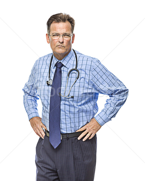 Serious Male Doctor with Stethoscope on White Stock photo © feverpitch