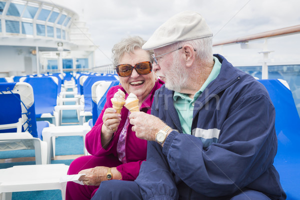 Senior Couple Enjoying Ice Cream On Deck Of Cruise Ship Stock photo © feverpitch