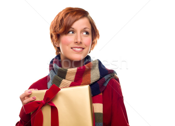 Pretty Girl with Gift Looking to the Side Isolated Stock photo © feverpitch