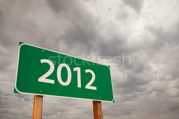 2012 zielone znak drogowy burzowe chmury dramatyczny niebo Zdjęcia stock © feverpitch