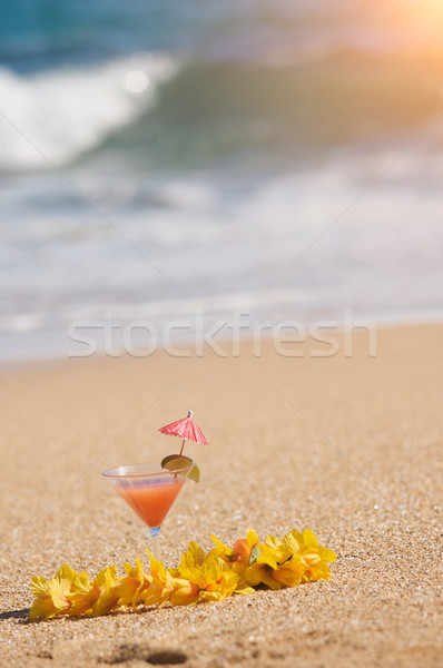 Tropical Drink on Beach Shoreline Stock photo © feverpitch