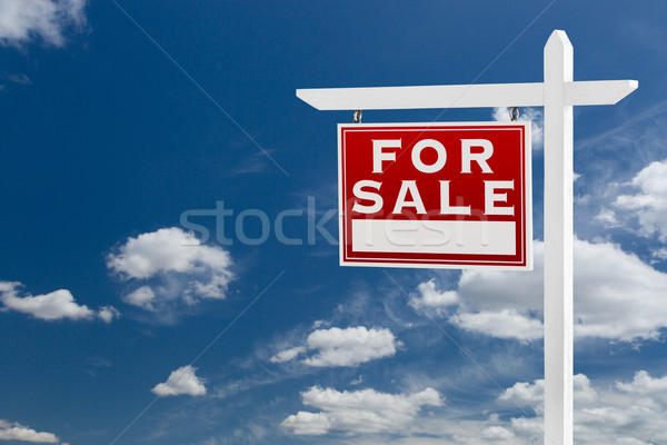 Stock photo: Left Facing For Sale Real Estate Sign Over Blue Sky and Clouds W
