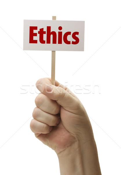 Ethics Sign In Fist On White Stock photo © feverpitch