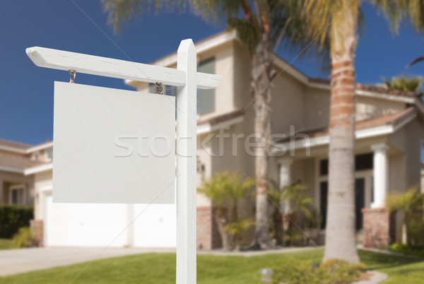 Stock photo: Blank Real Estate Sign in Front of New House 