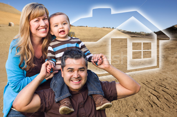 Mixed Race Family at Construction Site with Ghosted House Behind Stock photo © feverpitch