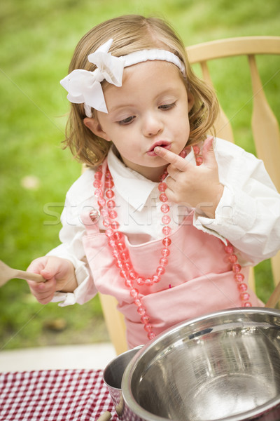 Adorable Little Girl Playing Chef Cooking Stock photo © feverpitch