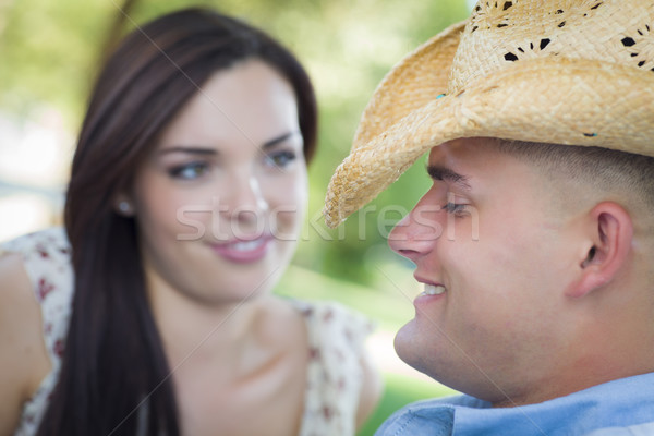 Romantica Coppia cappello da cowboy flirtare parco Foto d'archivio © feverpitch