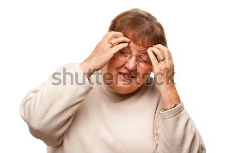 Senior Woman with Aching Head on White Stock photo © feverpitch