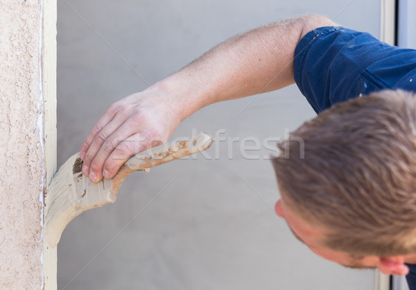 Professional Painter Cutting In With Brush to Paint House Door F Stock photo © feverpitch