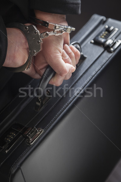 Woman In Handcuffs Carrying Briefcase Stock photo © feverpitch
